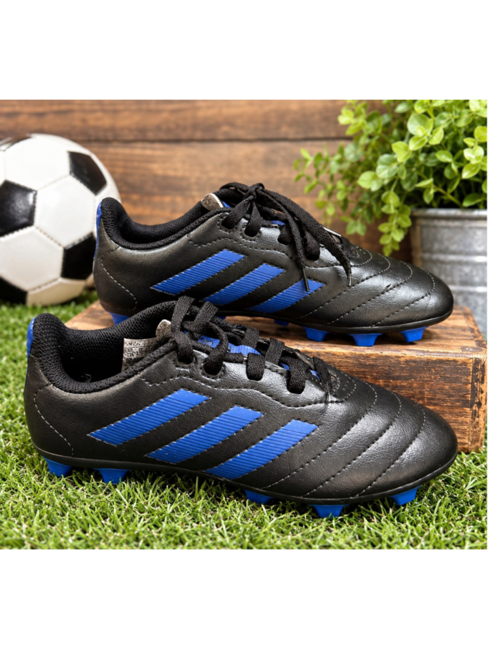 Black and navy blue Adidas cleats size 13 youth